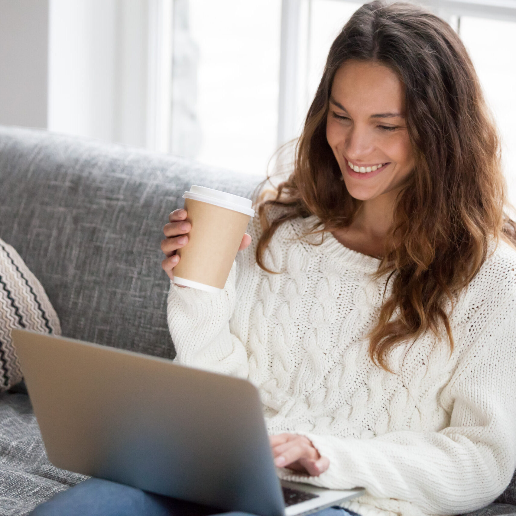 Smiling,Young,Woman,Enjoying,Morning,Coffee,Using,Laptop,Sitting,At